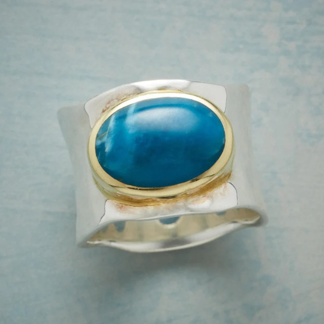Vintage Silberring mit ovalem blauem Stein