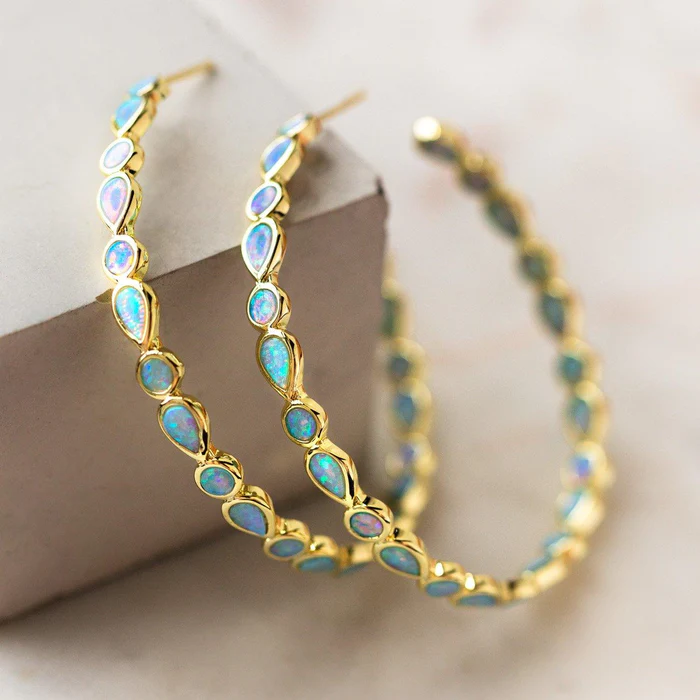 Vintage-Ohrringe mit blauem Opal und Goldring